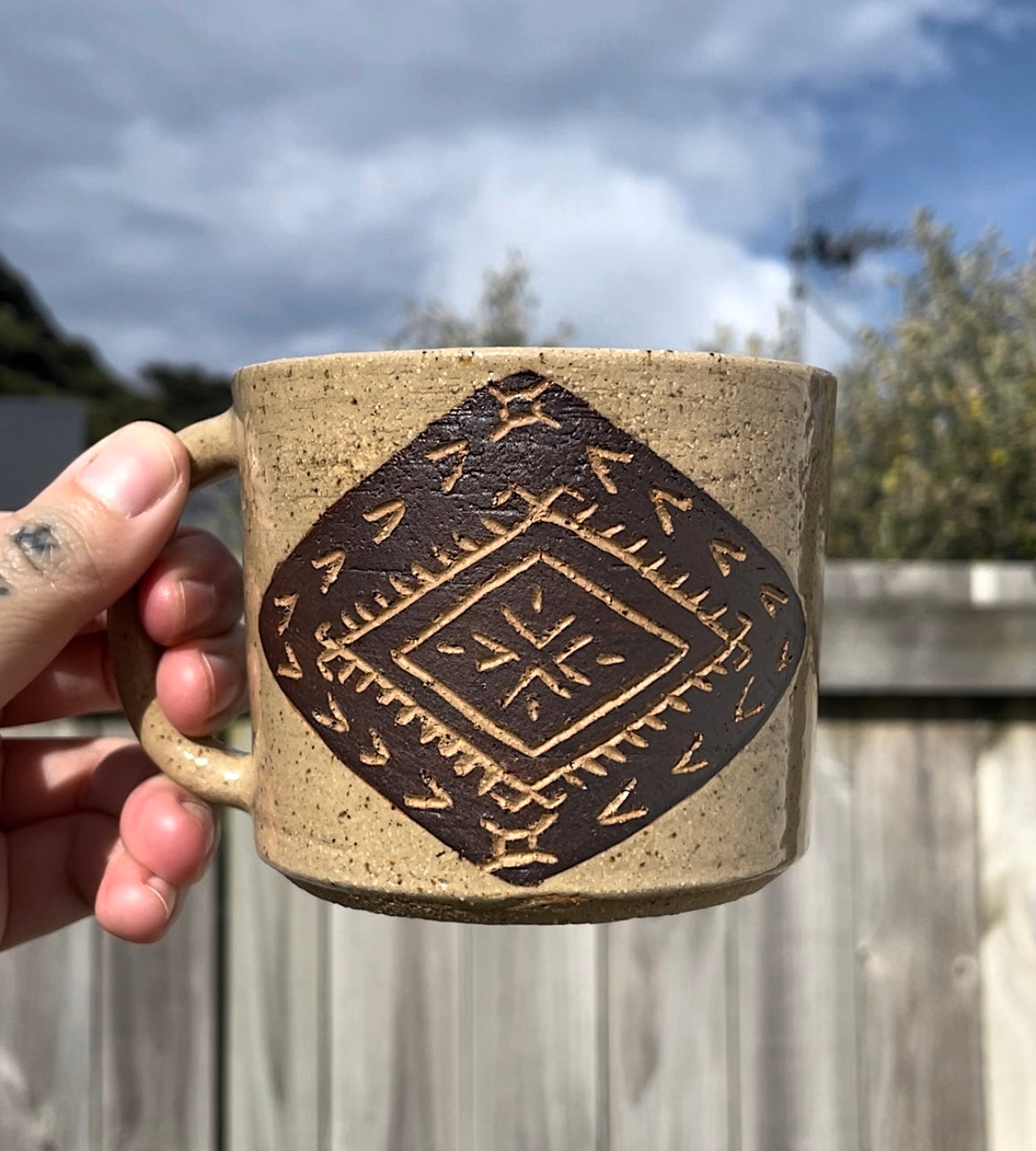 Hand Carved Ceramic Malu Mug Brown (132) by MASINA CREATIVE