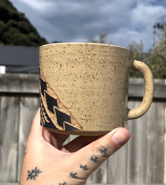 Hand Carved Ceramic Tatau Mug Brown (137) by MASINA CREATIVE