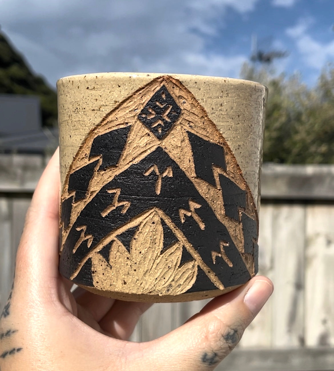 Hand Carved Ceramic Tatau Mug Brown (139) by MASINA CREATIVE