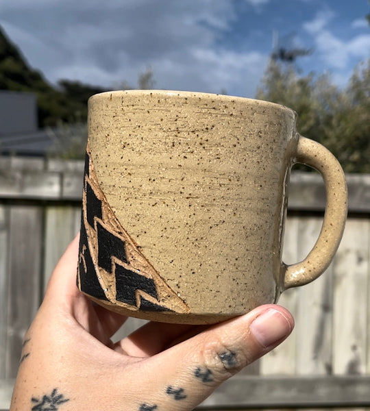 Hand Carved Ceramic Tatau Mug Brown (139) by MASINA CREATIVE