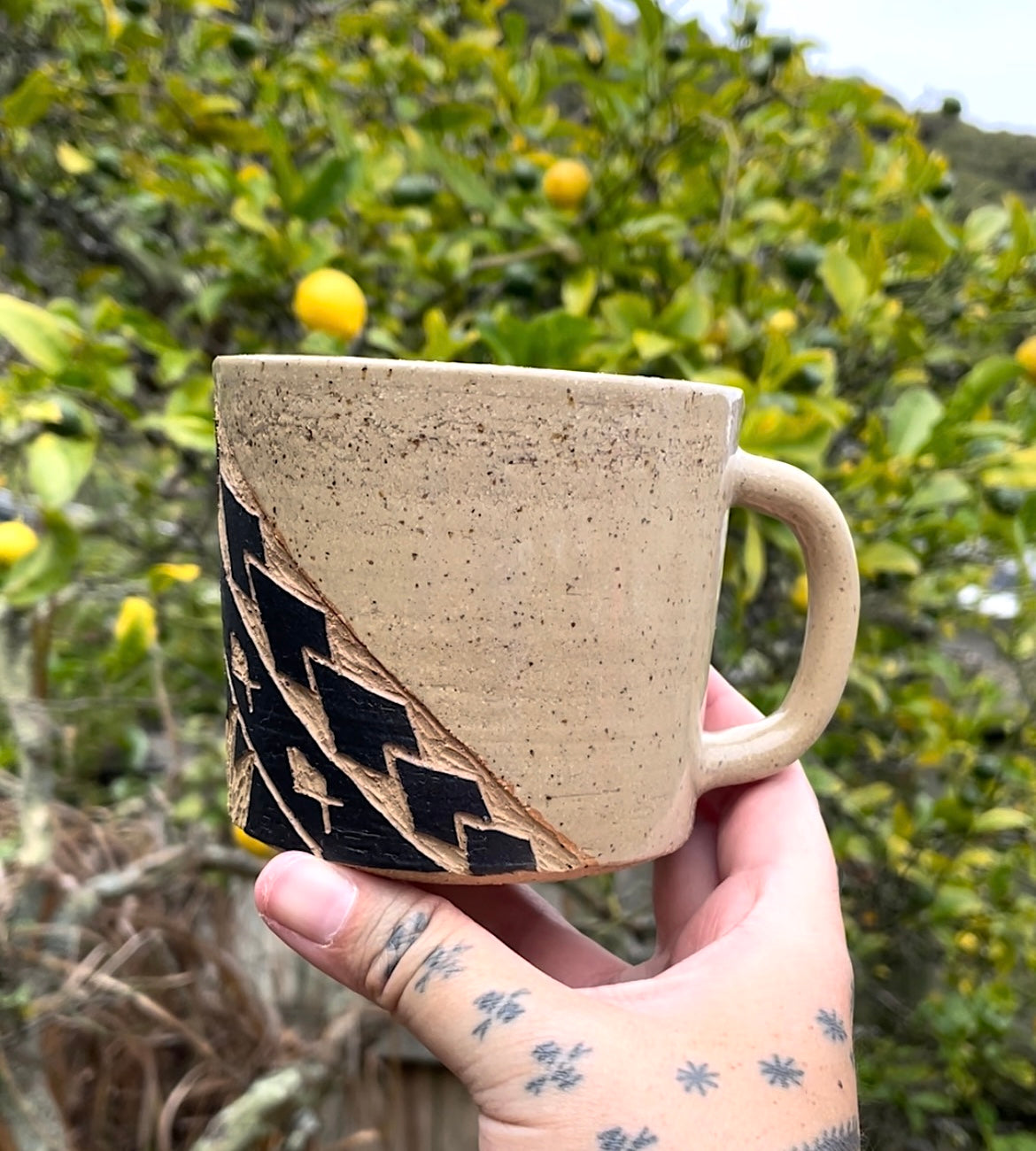 Hand Carved Ceramic Tatau Mug Brown (158) by MASINA CREATIVE