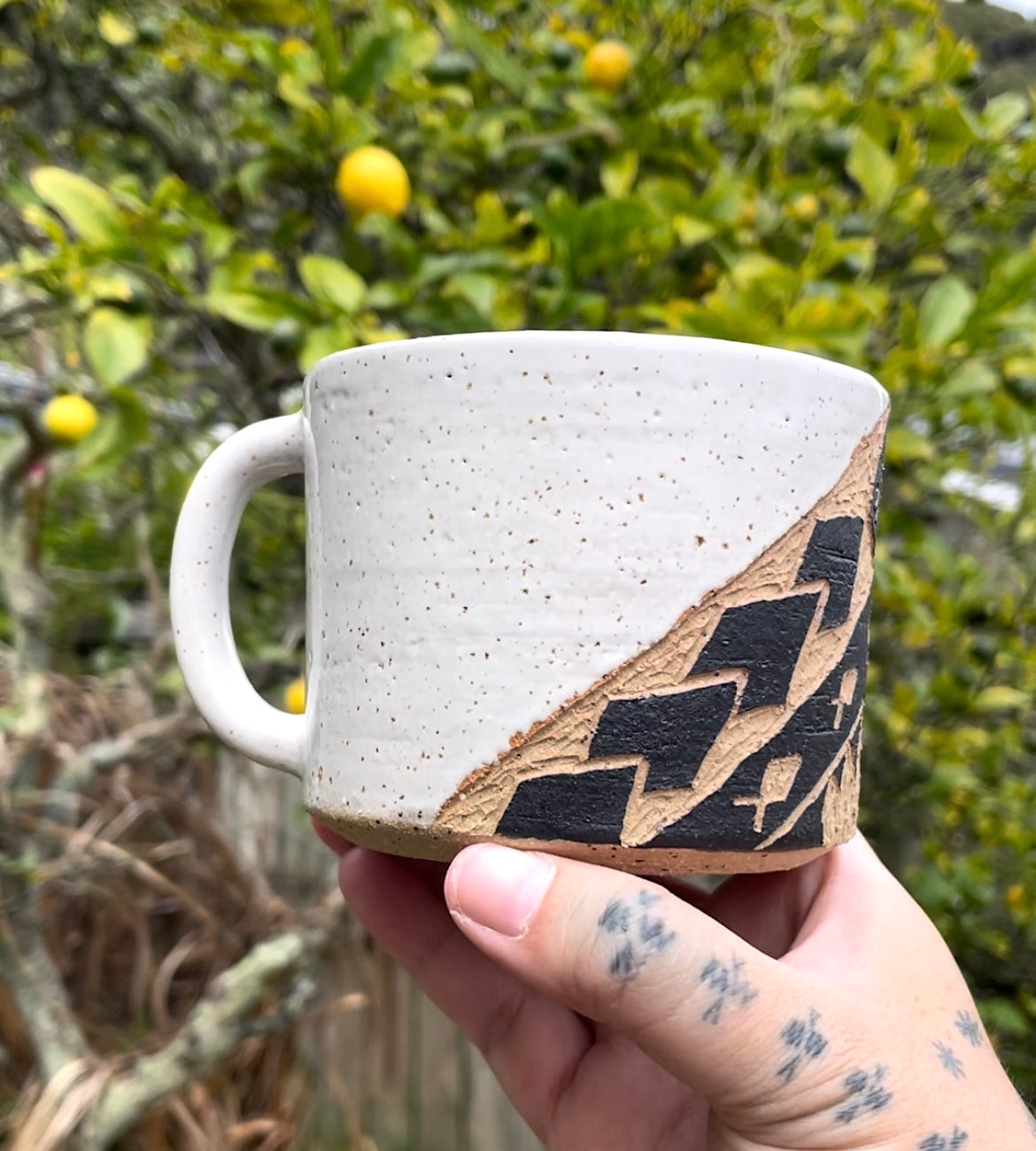 Hand Carved Ceramic Tatau Mug White (161) by MASINA CREATIVE