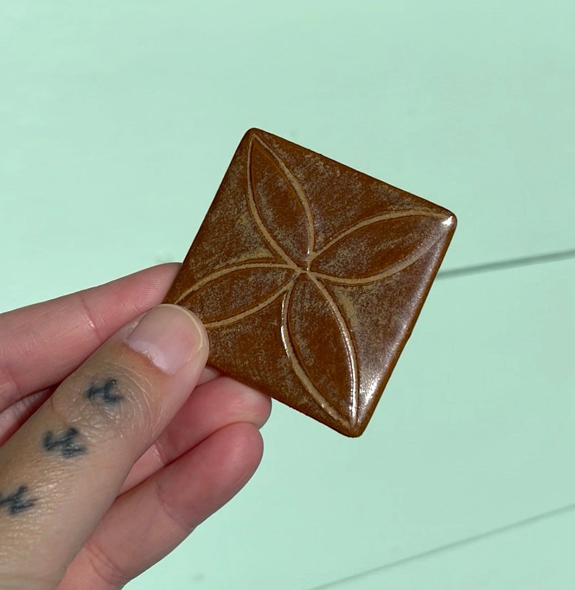 Hand Carved Ceramic Siapo Magnet (dark brown) by MASINA CREATIVE