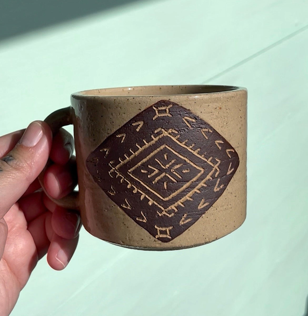 Hand Carved Ceramic Malu Mug Brown (244) by MASINA CREATIVE