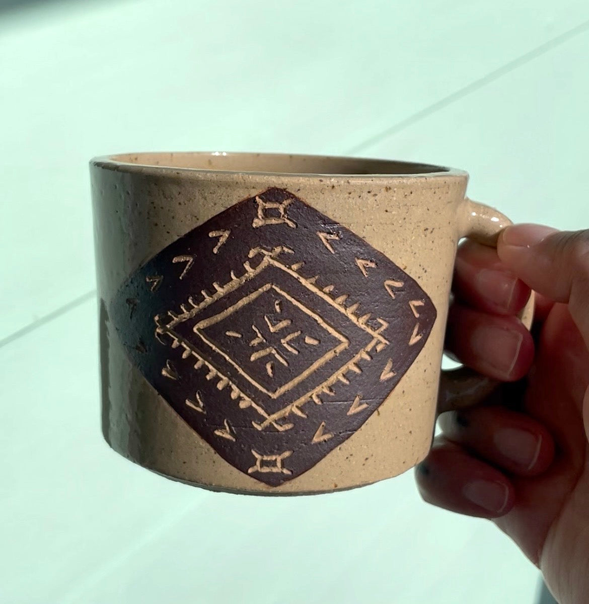 Hand Carved Ceramic Malu Mug Brown (245) by MASINA CREATIVE