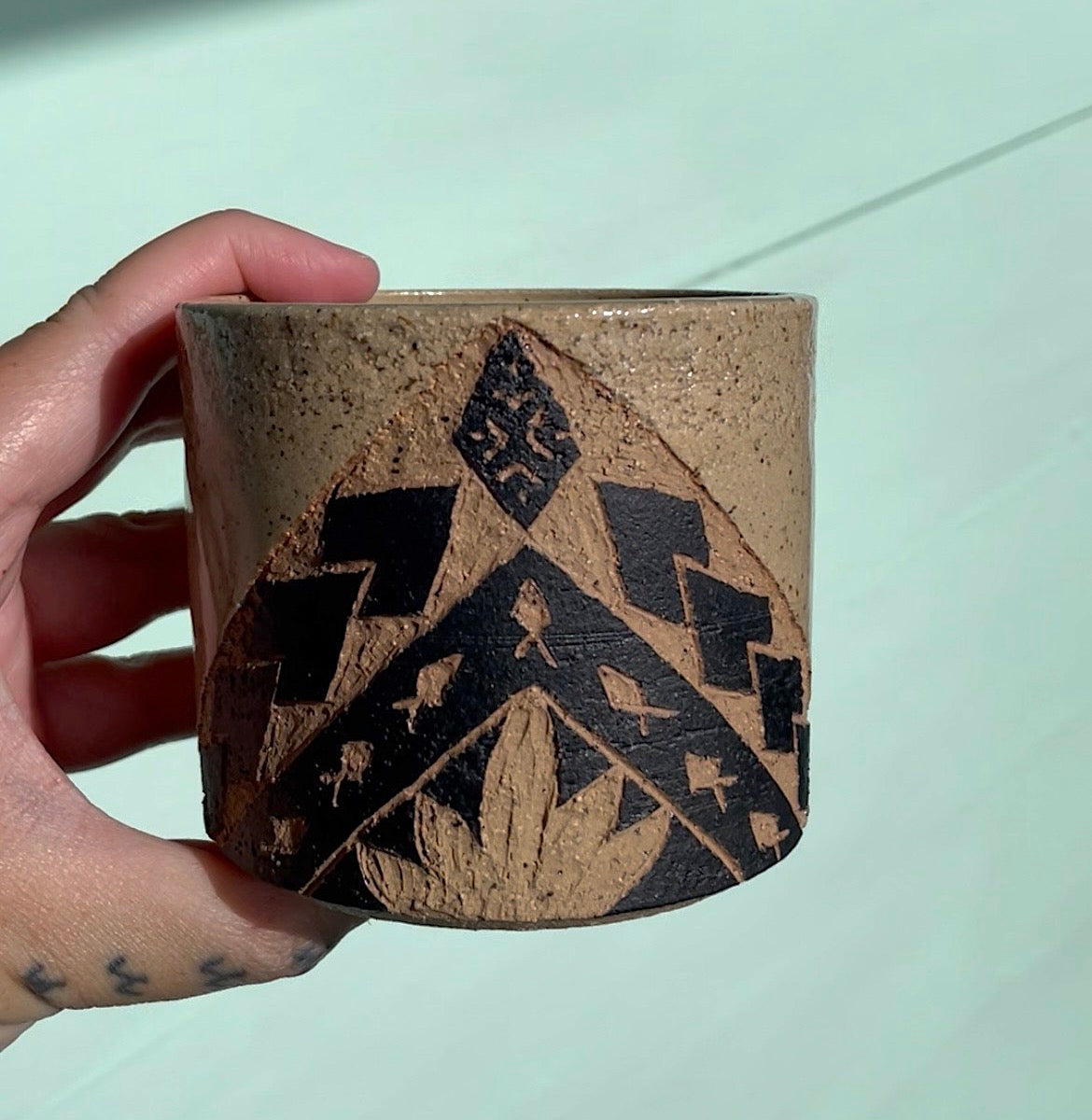 Hand Carved Ceramic Tatau Mug Brown (246) by MASINA CREATIVE