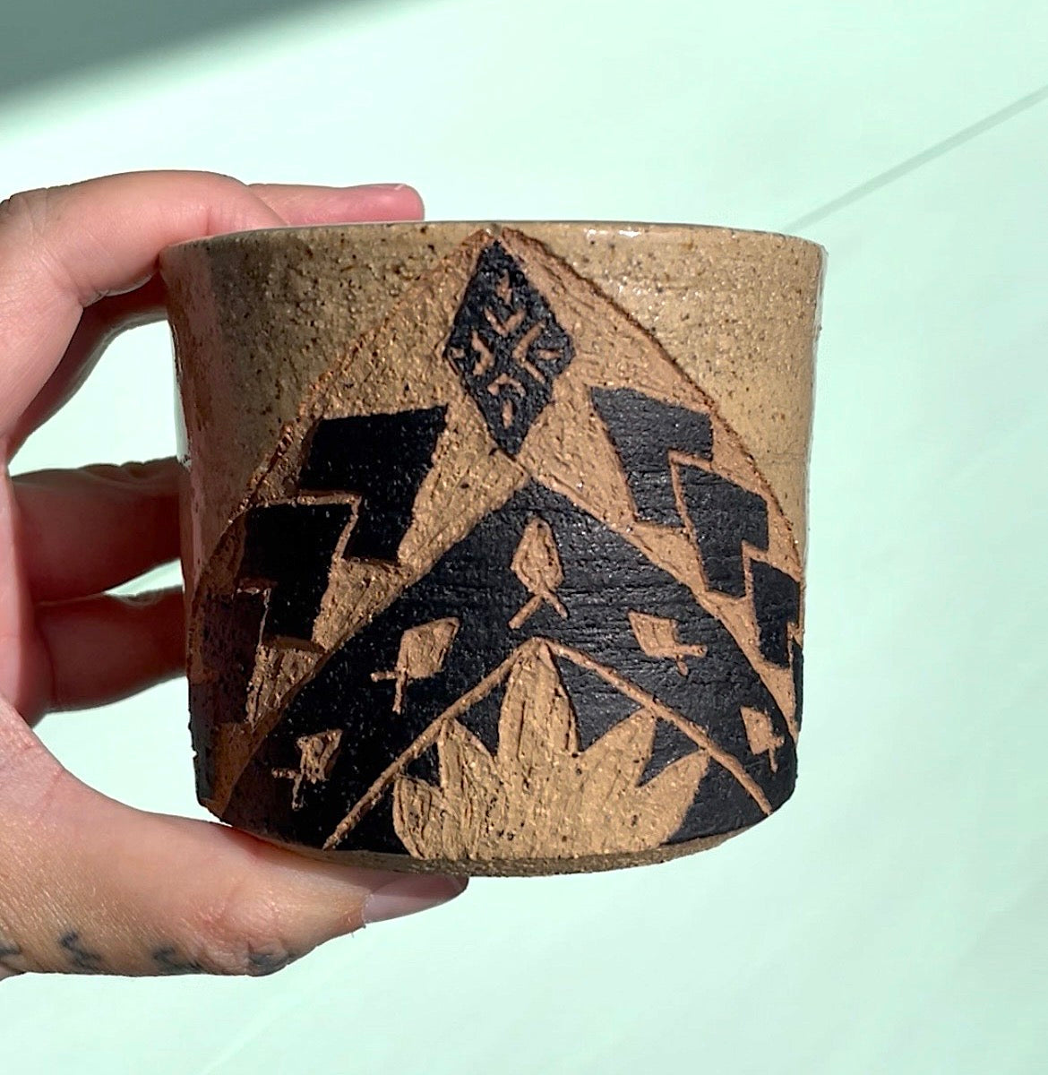 Hand Carved Ceramic Tatau Mug Brown (247) by MASINA CREATIVE