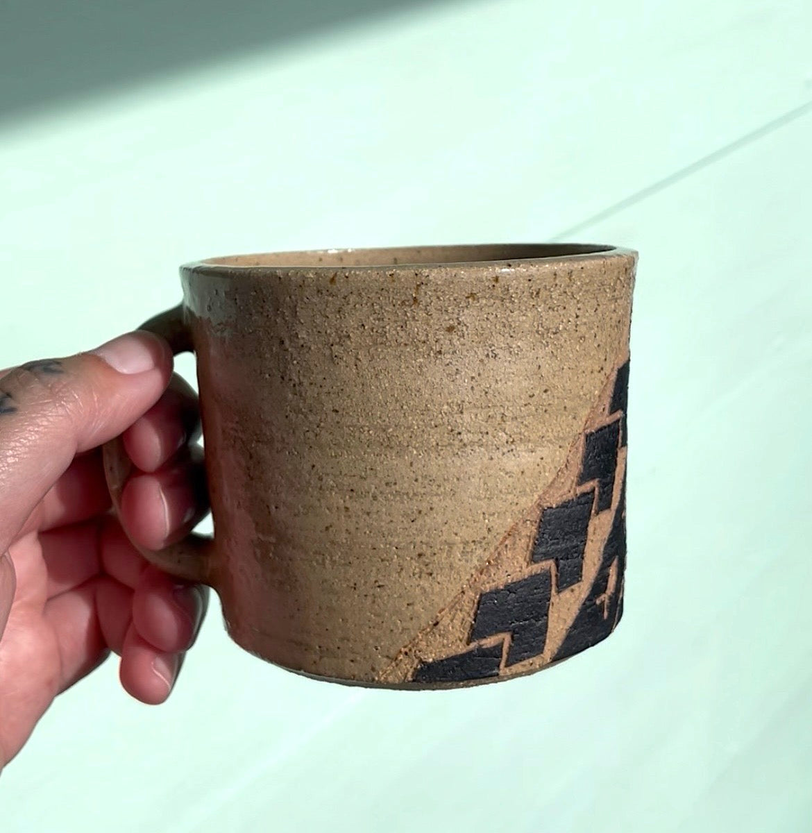 Hand Carved Ceramic Tatau Mug Brown (247) by MASINA CREATIVE