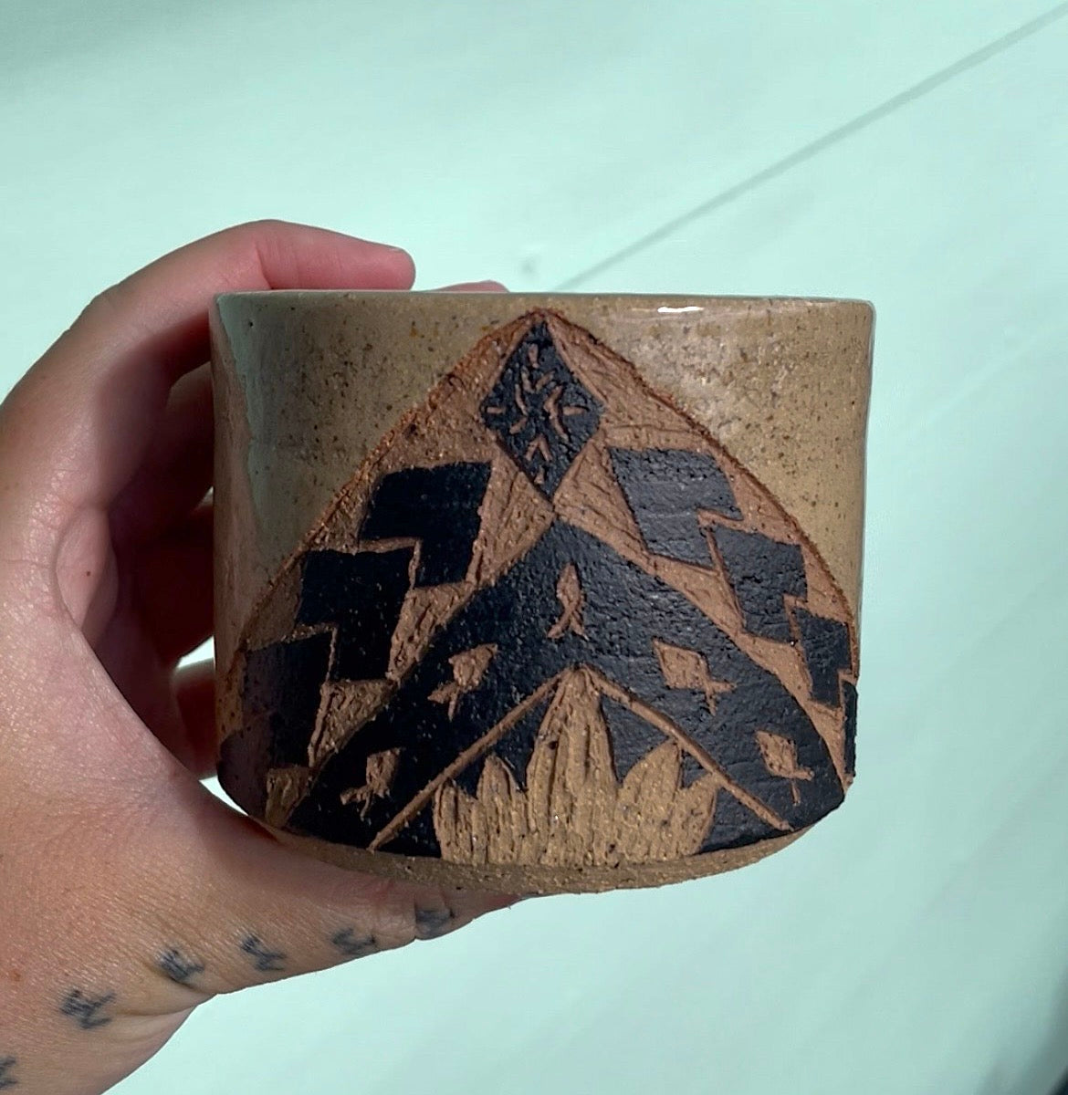 Hand Carved Ceramic Tatau Mug Brown (248) by MASINA CREATIVE