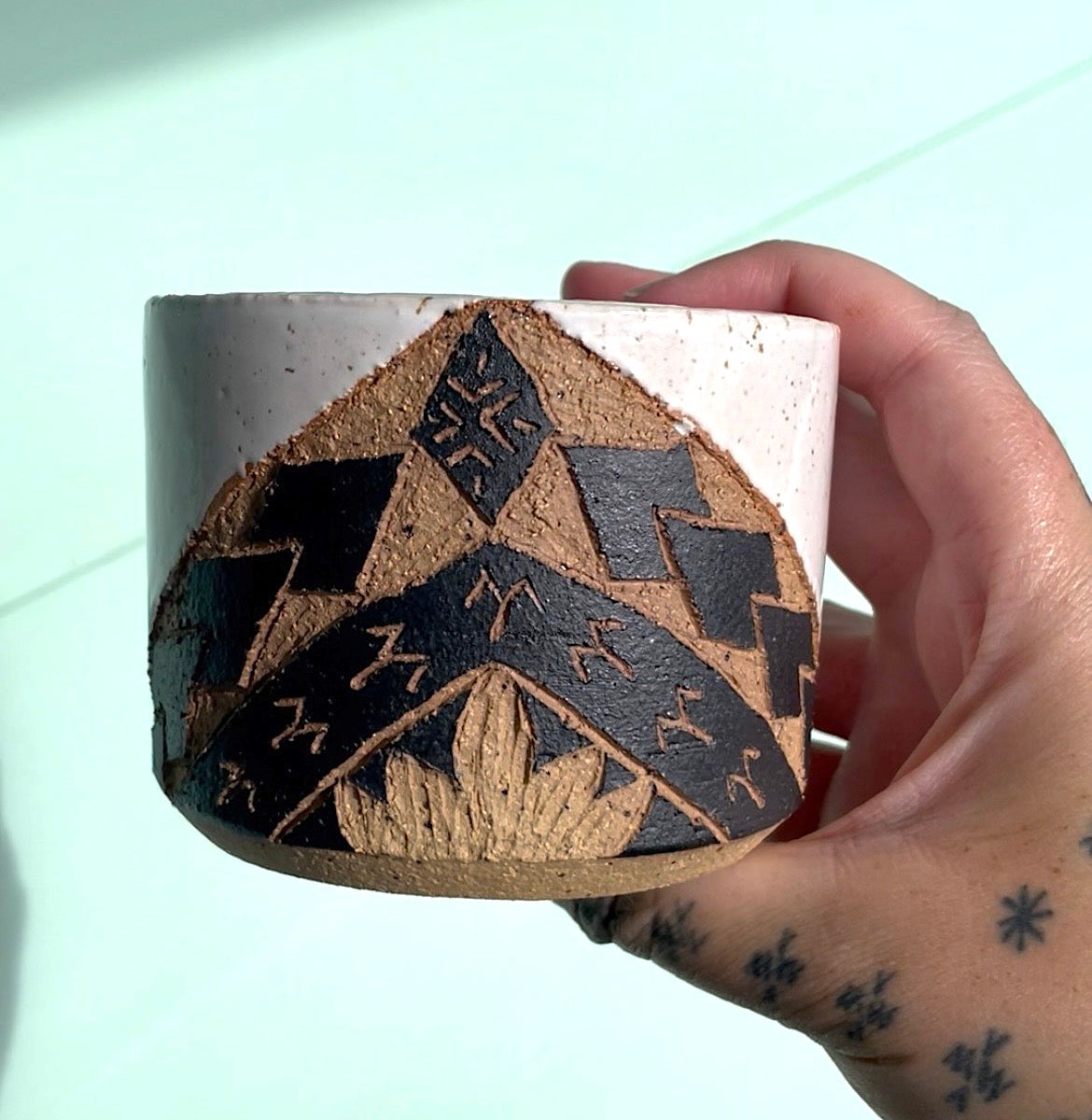 Hand Carved Ceramic Tatau Mug White (250) by MASINA CREATIVE