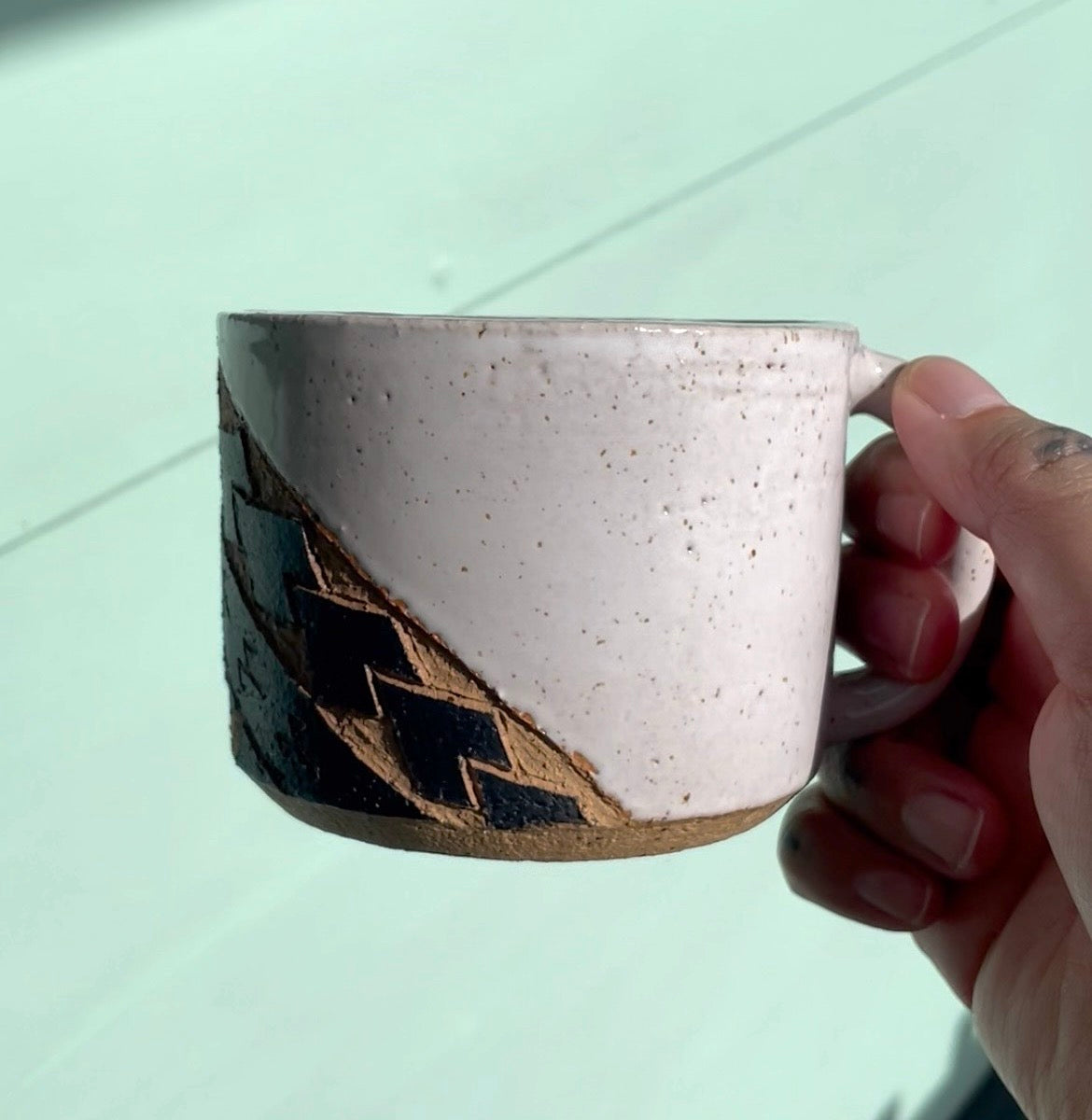 Hand Carved Ceramic Tatau Mug White (250) by MASINA CREATIVE