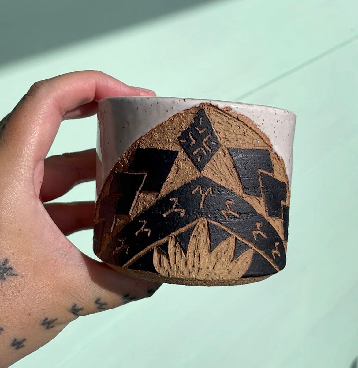 Hand Carved Ceramic Tatau Mug White (251) by MASINA CREATIVE