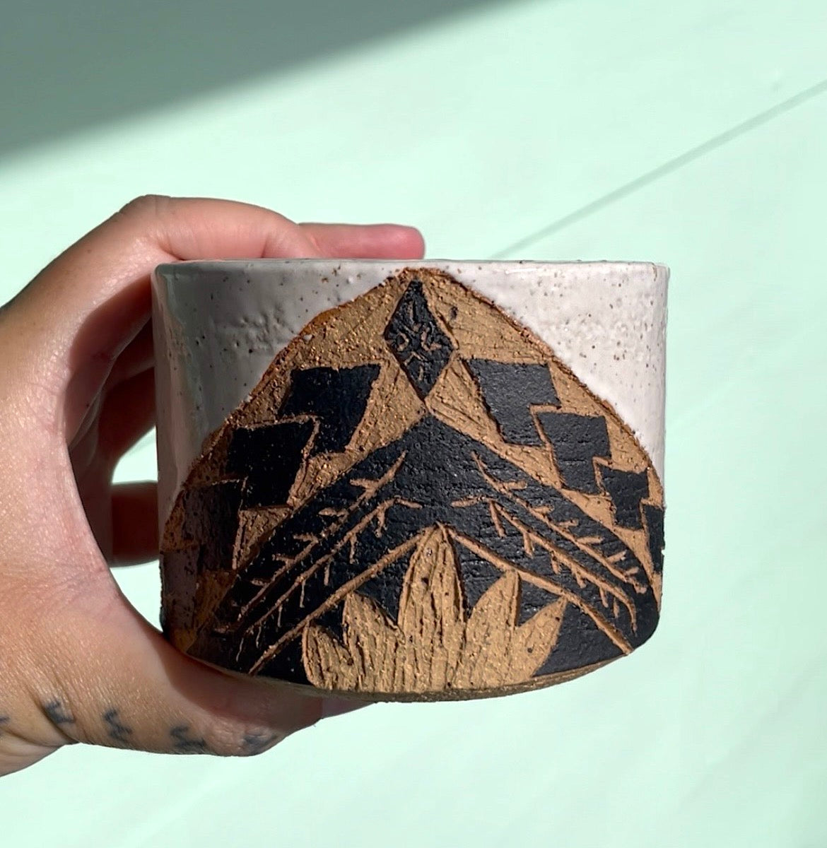 Hand Carved Ceramic Tatau Mug White (252) by MASINA CREATIVE