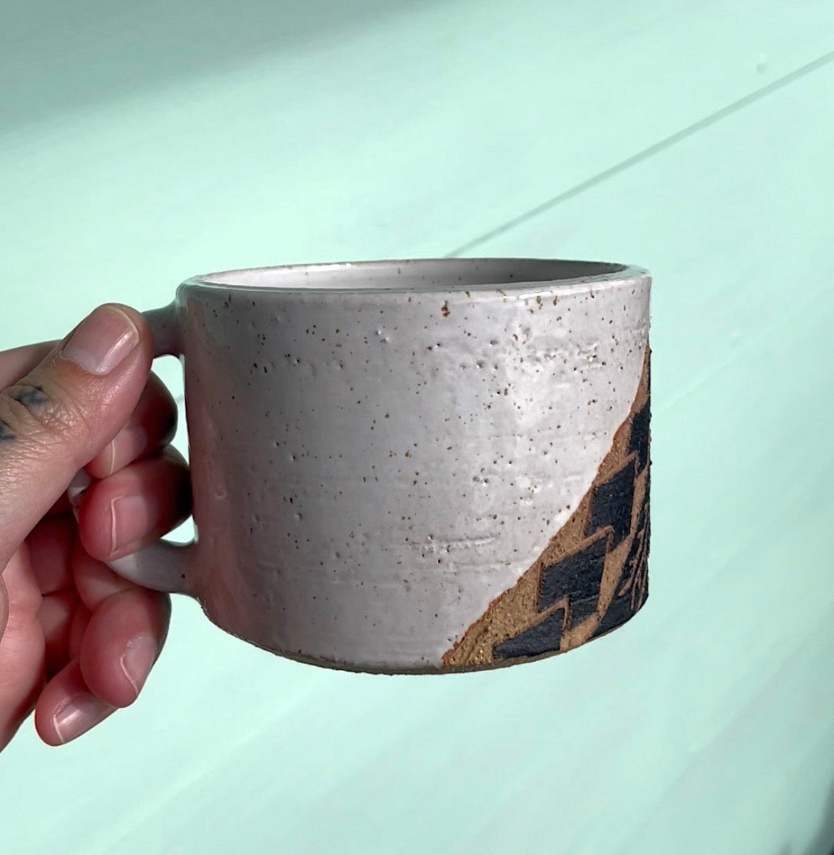 Hand Carved Ceramic Tatau Mug White (252) by MASINA CREATIVE