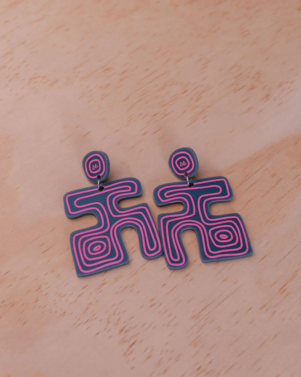 Pūtake earrings by Miss Maia